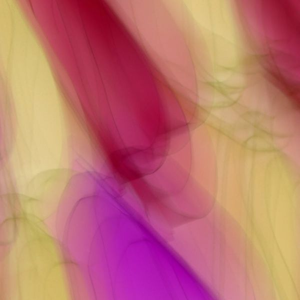 Abstract image of light trails showing fluid movement.